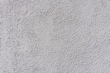 White volumetric plaster on the wall.