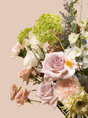 Close-Up of a Delicate Flower Bouquet with Roses, Viburnum, and Carnations