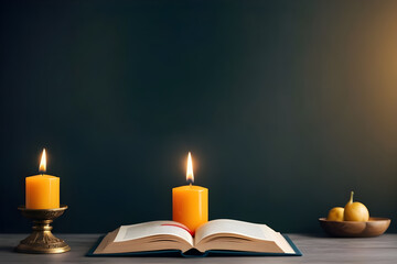 Two burning candles illuminating open book on world religion day
