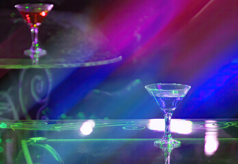 Nightlife Reflections: A Martini Under the Neon Glow
