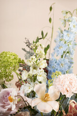Elegant Floral Arrangement with Peach Tulip and Blue Delphinium