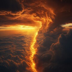 Fototapeta premium Awe-inspiring Aerial View of Dramatic Cloud Formation Illuminated by the Fiery Glow of a Setting Sun, Creating a Majestic and Breathtaking Natural Spectacle in the Sky