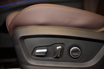Explore the intricate functions of premium luxury car seat control buttons in detail