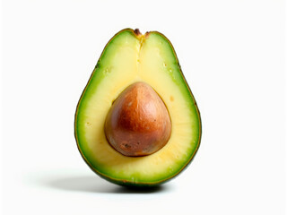 Image shows a freshly cut avocado with dark green skin and lightdark green interior, displaying a small amount of moisture The oval seed is smooth in texture No additional objec - Generative AI