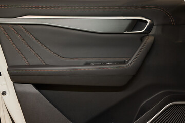 A car door with trim showcasing automotive design details