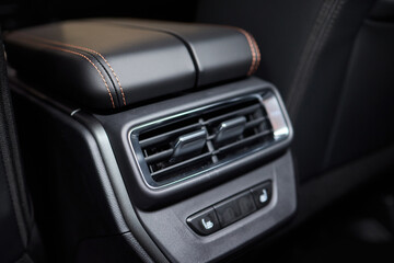 A close up of a car s rear air conditioning system