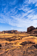 Tadrart Rouge, meaning Red Mountain, a mountain range in southeastern Algeria, part of the Algerian Desert providing massive dunes, rock formations and Martian landscapes