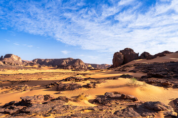 Tadrart Rouge, meaning Red Mountain, a mountain range in southeastern Algeria, part of the Algerian Desert providing massive dunes, rock formations and Martian landscapes