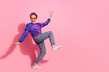 Full length photo of lovely pensioner lady sunglass dancing discotheque dressed blue colorful garment isolated on pink color background