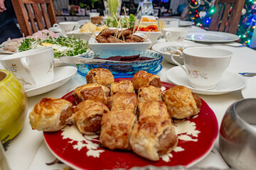 Homemade sausage rolls as part of a buffet style Christmas tea.