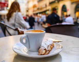 Espresso and cannoli served at outdoor italian cafe