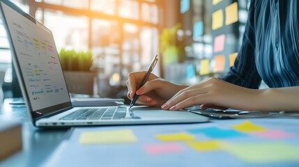 Woman Designing User Interface On Laptop