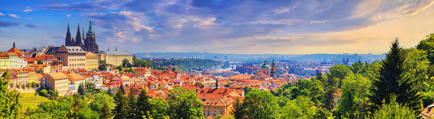 Summer cityscape, panorama, banner - view of the Hradcany historical district of Prague and castle...