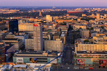 Cityscape at sunset - top view of central Warsaw, the municipal neighbourhood of Centrum, located...
