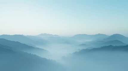 Fototapeta premium Misty Dawn Over Tranquil Rolling Hills - Serene Landscape Photography of Foggy Scenery at Sunrise
