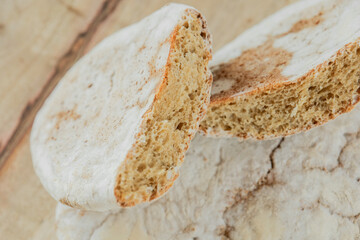 Moldy bread.Expired product with mold. Slices of moldy bread on a wooden cutting board. White mold...