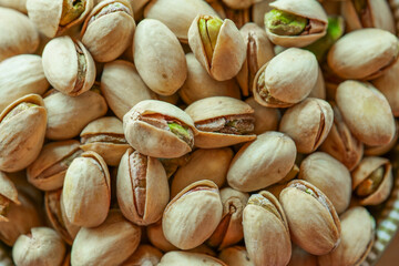 Pistachios close-up.Healthy fats.Delicious pistachio. Vegetarian plant-based protein source. Healthy snack 