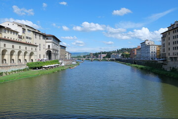 Fototapeta premium The Daily Life of the Arno River in Florence, Romantic Italy