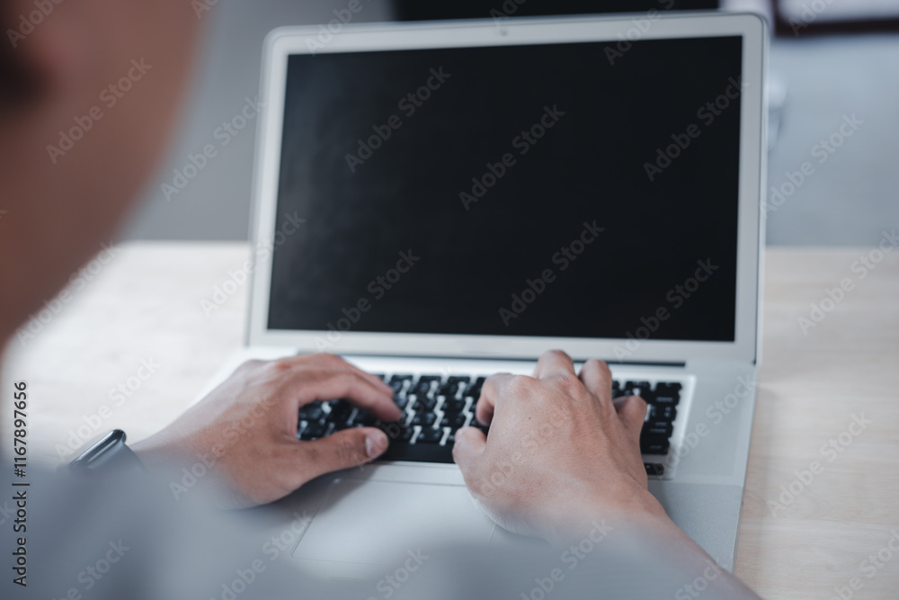 Aufkleber concept of using technology in communication.close-up a businessman working on his computer in the o