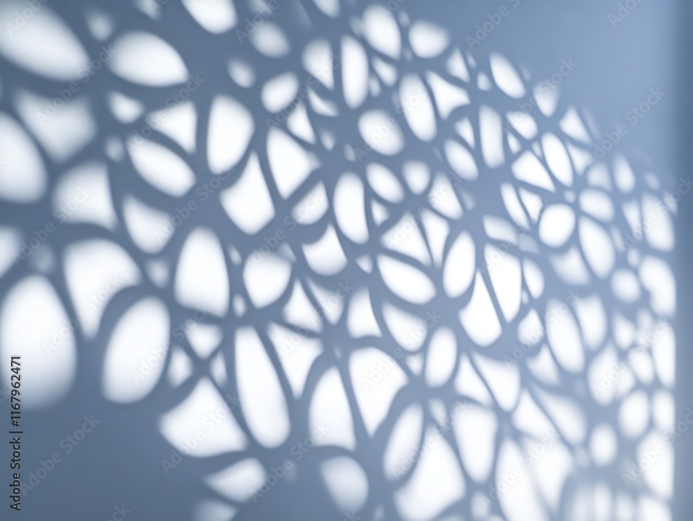 Poster abstract light and shadow pattern on a wall, creating an organic, textured design.