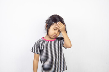 Portrait of little Asian girl posing on white background