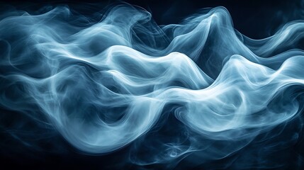 Obraz premium Abstract blue smoke swirls on black background.