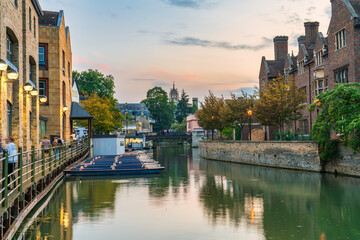 Punts on quayside of the river Cam in Cambridge at sunrise. England