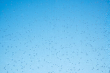 Abstract icy winter window glass, as background.