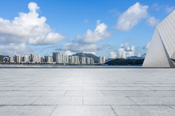 Empty square floor and city skyline with modern buildings scenery in Zhuhai, China. Outdoor city background.