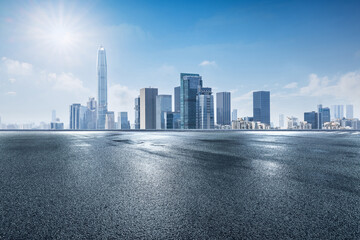 Asphalt road square with modern city buildings scenery in Shenzhen, China. Outdoor city background.