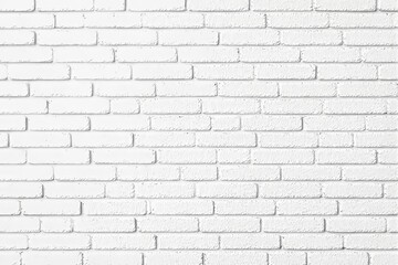 Obraz premium White brick wall with a clean, textured surface, arranged in a uniform pattern, on a bright background. Concept of minimalism and simplicity. Ai generative