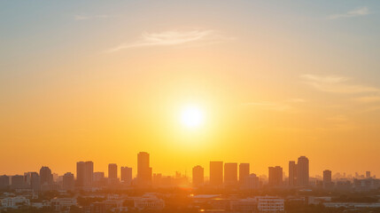 Obraz premium Golden City Sunset: A mesmerizing silhouette of a city skyline bathed in the golden hues of a breathtaking sunset, capturing the tranquility and beauty of urban life at dusk. 
