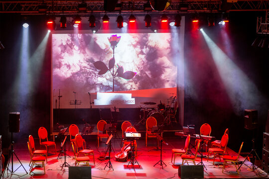 Preparing for the concert performance cover versions of songs by Depeche Mode - stage with musical instruments under bright spotlights