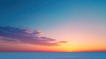 Fototapeta premium Pastel skies concept. A stunning sunset with vibrant colors blending into a serene sky at twilight.