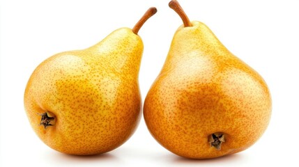 Two ripe yellow pears stand side by side