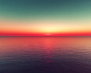 Fototapeta premium Vibrant red sunset over calm ocean.