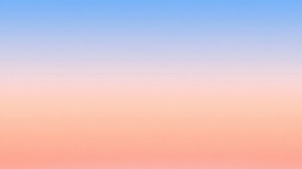 Obraz premium Soft gradient sky transitioning from warm orange to cool blue during sunset