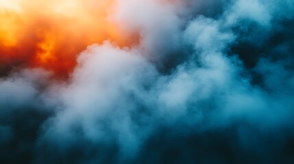 Fiery Sunset Cloudscape: A Dramatic Teal and Orange Abstract