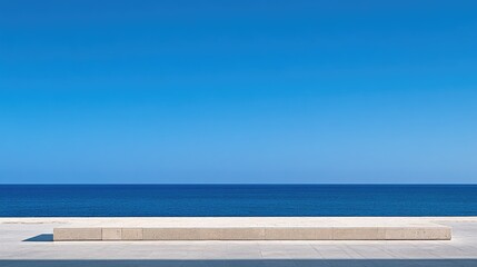 A bright and cloudless sky with a deep blue color, offering an expansive, open backdrop perfect for a minimalist or clean design.