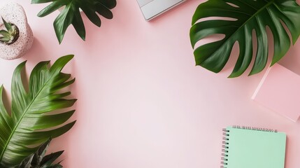 Minimalist workspace with a computer, notebook, and plants for a productivity tool ad