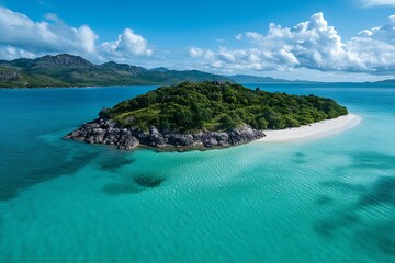 Obraz premium Aerial shot of a deserted island with pristine white beaches 
