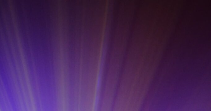Lasershow with Multiple Laser Beams in Fog, The concepts of performance arts, Colored light beams from reflector through the foggy night sky