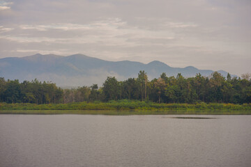 travel and people activity concept with cloud and sky  with mountain and lake on foreground