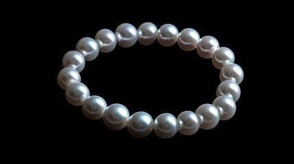 Obraz premium White Pearl Necklace on Black Background