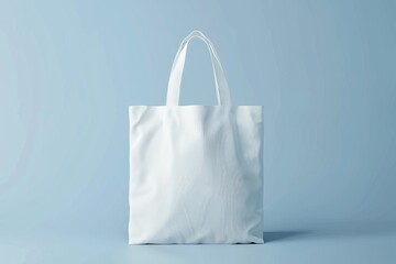 White tote bag on light blue background. (5)