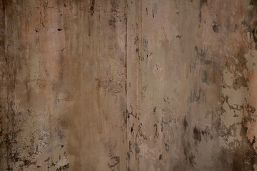 Old weathered rough white wall weathered in the apartment as a background, white wall