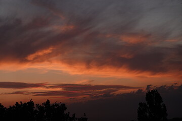 Obraz premium Rose sunset and colorful clouds