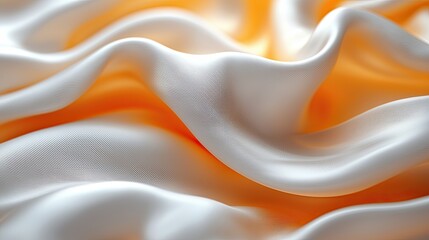 Obraz premium Soft silk fabric draped gracefully with gentle waves in a warm light setting