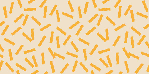 Abstract seamless horizontal pattern of yellow short chaotic wavy stripes on light background, confetti, flat style