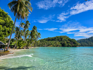 Discover the tranquil beauty of Koh Kood's pristine beaches under a clear blue sky